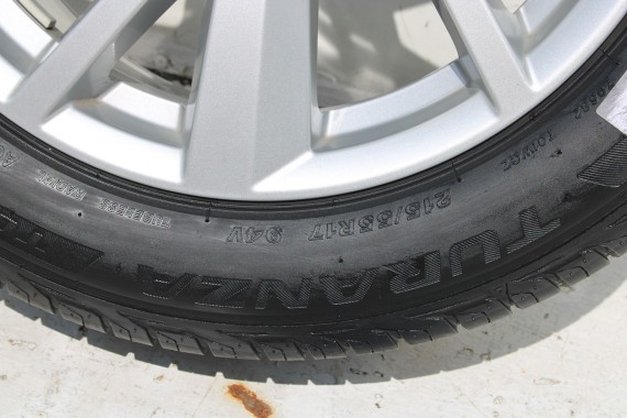 AUDI Q2 FELGI 17 OPONY LETNIE KOŁA 81A601025C felga 7J*17H2 ET45  opona LATO Bridgestone Turanza T001 215/55/17 94V 81A 2016-
