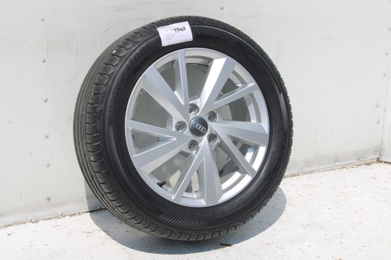 AUDI Q2 FELGI 17 OPONY LETNIE KOŁA 81A601025C felga 7J*17H2 ET45  opona LATO Bridgestone Turanza T001 215/55/17 94V 81A cali
