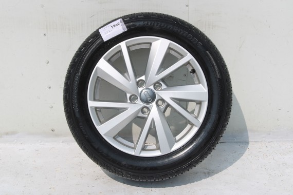 AUDI Q2 FELGI 17 OPONY LETNIE KOŁA 81A601025C felga 7J*17H2 ET45  opona LATO Bridgestone Turanza T001 215/55/17 94V 81A cali