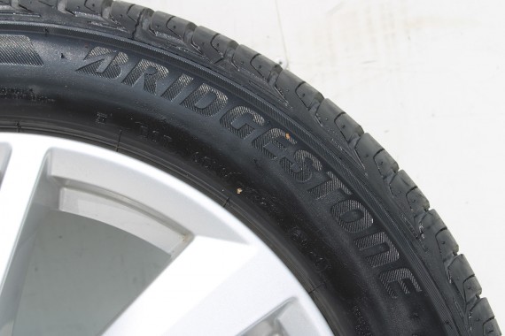 AUDI Q2 FELGI 17 OPONY LETNIE KOŁA 81A601025C felga 7J*17H2 ET45  opona LATO Bridgestone Turanza T001 215/55/17 94V 81A cali