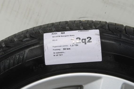 AUDI Q2 FELGI 17 OPONY LETNIE KOŁA 81A601025C felga 7J*17H2 ET45  opona LATO Bridgestone Turanza T001 215/55/17 94V 81A cali