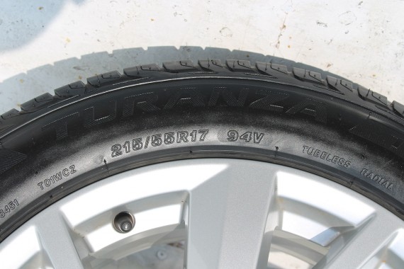 AUDI Q2 FELGI 17 OPONY LETNIE KOŁA 81A601025C felga 7J*17H2 ET45  opona LATO Bridgestone Turanza T001 215/55/17 94V 81A cali